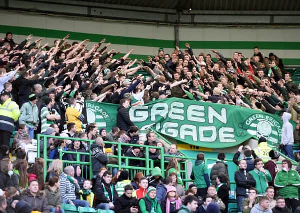Celtic fans unfurl a Green Brigade banner during the match against St Johnstone at Celtic Park. Picture: SNS