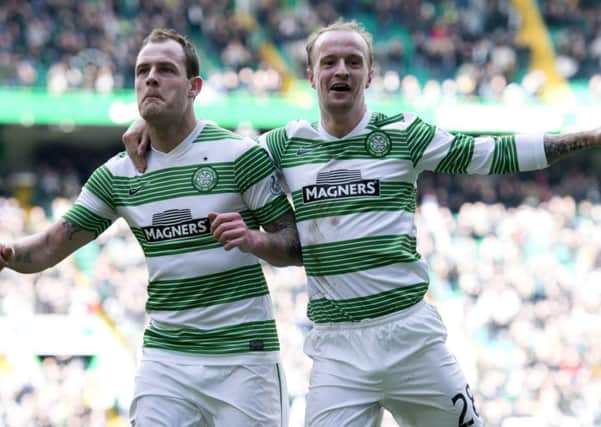 Anthony Stokes (left) is congratulatd by Leigh Griffiths after giving Celtic a 1-0 lead. Picture: SNS