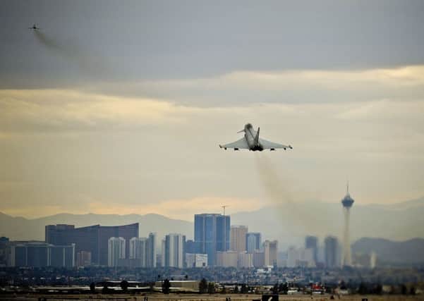 Typhoon aircraft take-off from Nellis Air Force Base towards the Las Vegas skyline. Picture: PA