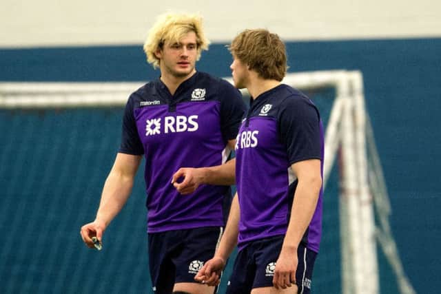 Scotland's Richie Gray (left) chats with brother Jonny during training. Picture: SNS
