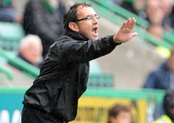 Pat Fenlon shouts instructions from the touchline during his time at Hibs. Picture: Ian Rutherford