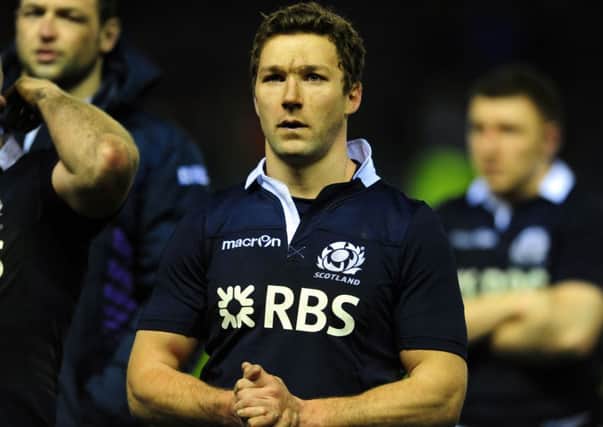 Cusiter, pictured after Scotland's defeat to England, will replace former Wales number nine Dwayne Peel. Picture: Ian Rutherford