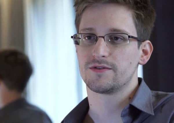 Edward Snowden defeated former champion cyclist Graham Obree, author Alan Bissett and the Rev Kelvin Holdsworth. Picture: AP