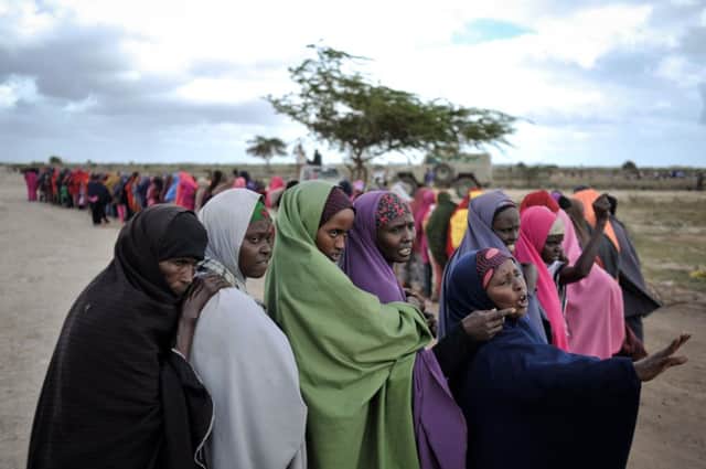 Somali refugees plead for food at a Red Crescent relief camp. Picture: AFP/Getty