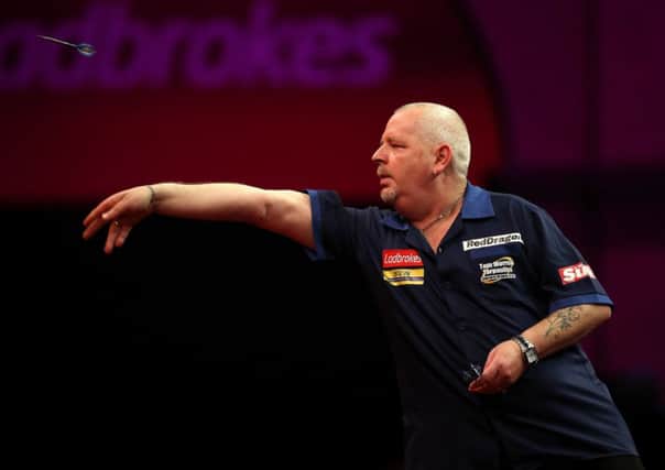 Robert Thornton has been defeated by Dave Chisnall and Michael van Gerwen. Picture: Getty