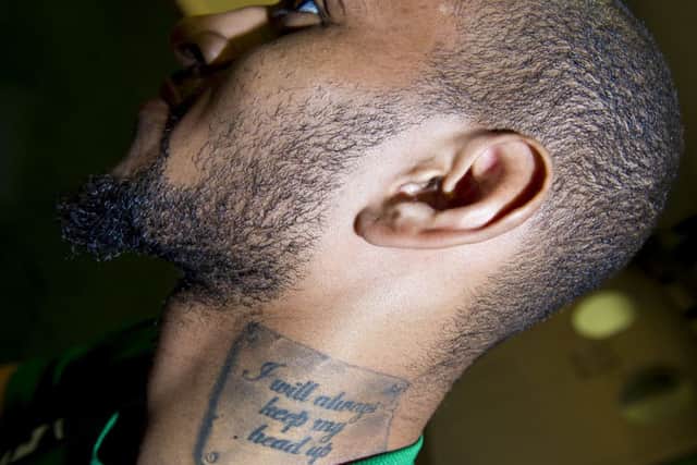 Danny Haynes shows off one of his many tattoos imprinted on the left side of his neck. Picture: SNS