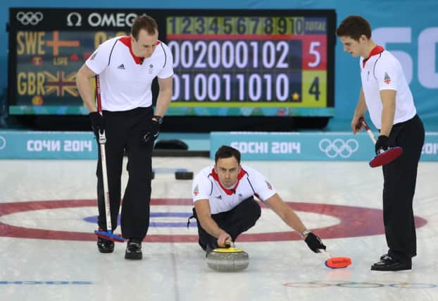 Team GB skip David Murdoch sends down another stone on the way to victory. Picture: PA