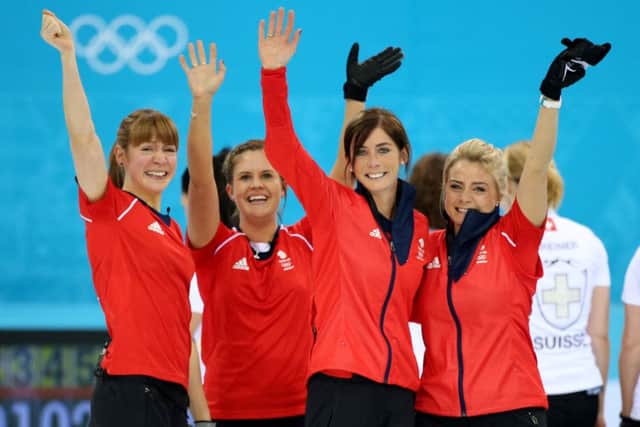 Claire Hamilton, Vicki Adams, Eve Muirhead and Anna Sloan celebrate winning the bronze. Picture: PA