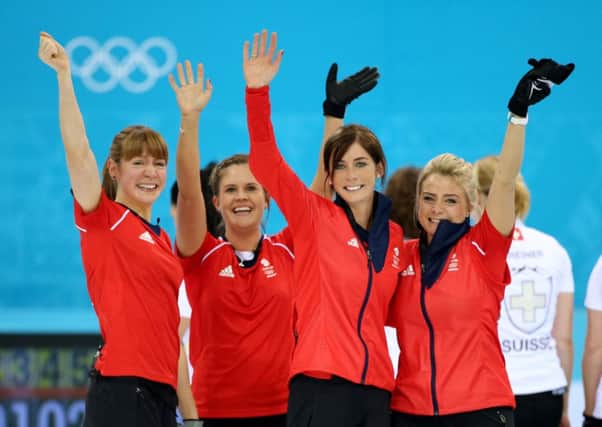 Claire Hamilton, Vicki Adams, Eve Muirhead and Anna Sloan celebrate winning the bronze. Picture: PA