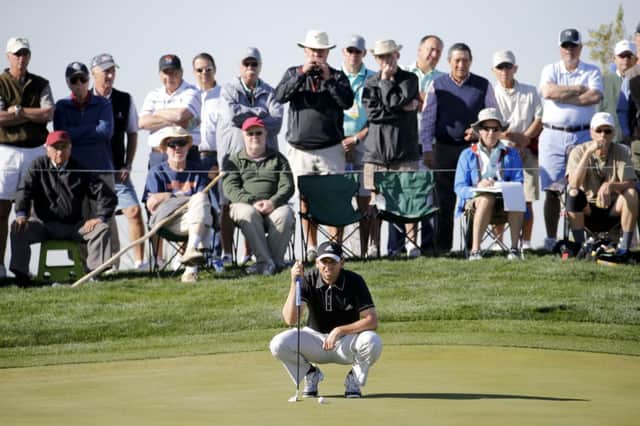 Spaniard Sergio Garcia finds himself the centre of attention against American Bill Haas. Picture: AP