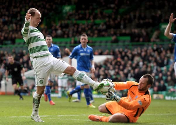 Alan Mannus saves from Celtic's Leigh Griffiths. Picture: SNS