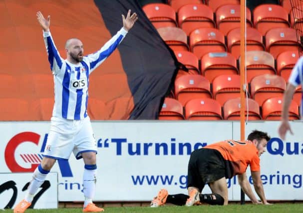 Terry Butcher knows Hibs will have to contain Kris Boyd tomorrow. Picture: Ian Rutherford