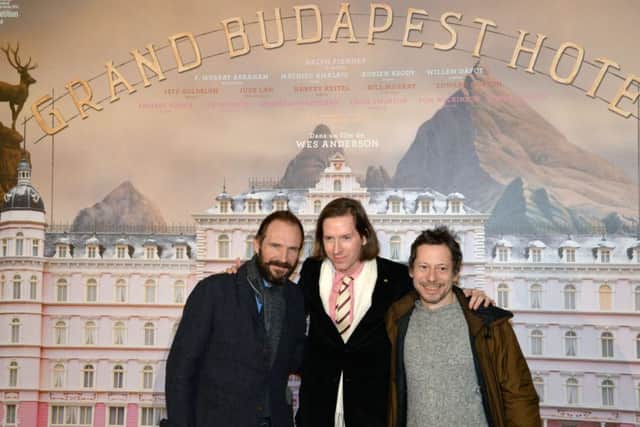 Ralph Fiennes and Mathieu Amalric with Wes Anderson in Paris last night. Picture: Getty