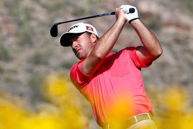 Graeme McDowell of Northern Ireland plays a shot on the 16th hole at Dove Mountain, Arizona. Picture: Getty