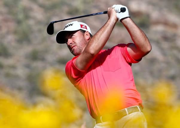 Graeme McDowell of Northern Ireland plays a shot on the 16th hole at Dove Mountain, Arizona. Picture: Getty