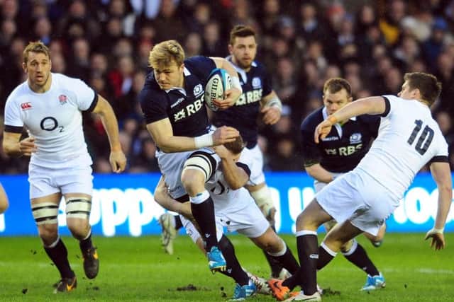 Scotland's David Denton charges through the England defence at Murrayfield earlier this month  Picture: Ian Rutherford