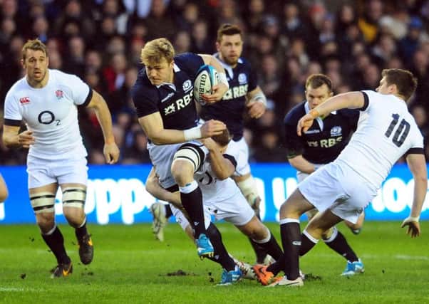 Scotland's David Denton charges through the England defence at Murrayfield earlier this month  Picture: Ian Rutherford