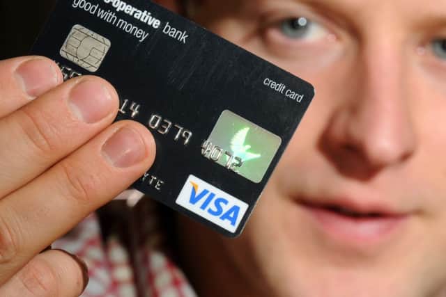 Credit card providers are turning down almost two in every three applications. Picture (posed by model): Jon Savage