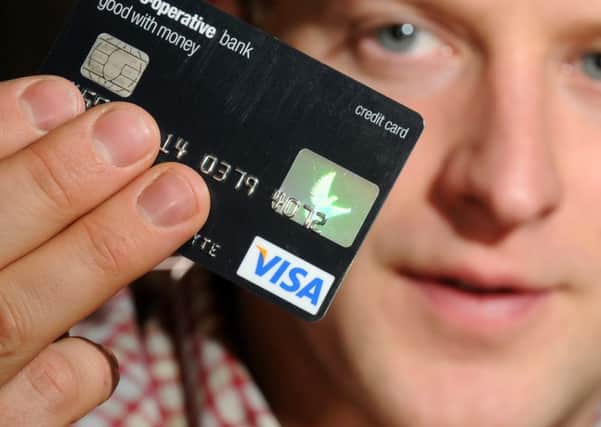 Credit card providers are turning down almost two in every three applications. Picture (posed by model): Jon Savage