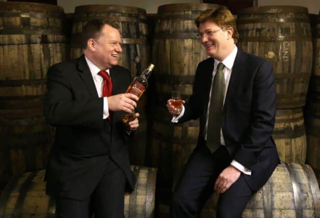 SWA chief David Frost with Danny Alexander. Picture: PA