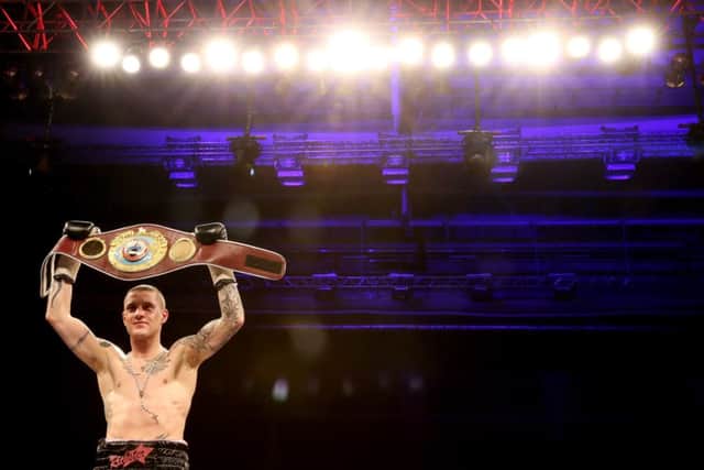 Ricky Burns celebrates his victory over Jose Gonzalez last May. Picture: Getty