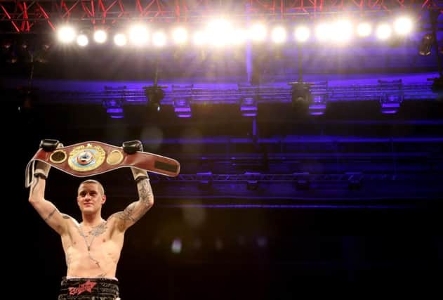 Ricky Burns celebrates his victory over Jose Gonzalez last May. Picture: Getty