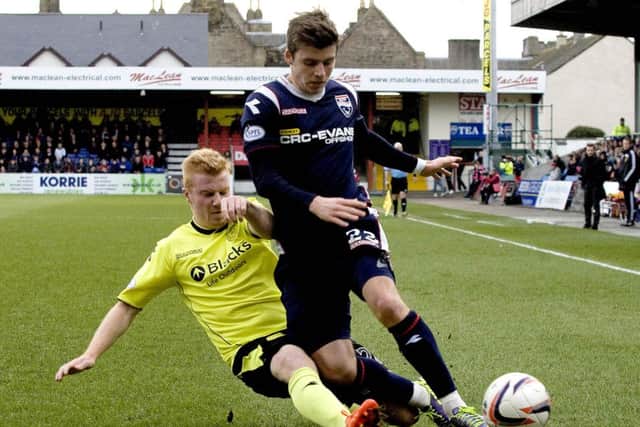 St Mirren's Conor Newton (left) challenges Graham Carey. Picture: SNS