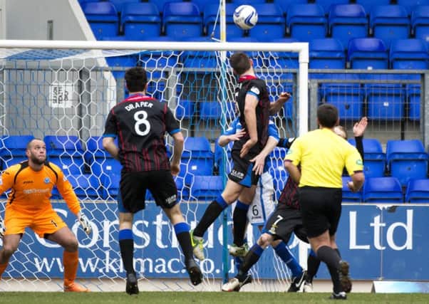 Gary Warren heads the ball home to give ICT the lead. Picture: SNS
