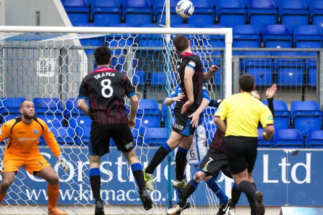 Gary Warren heads the ball home to give ICT the lead. Picture: SNS