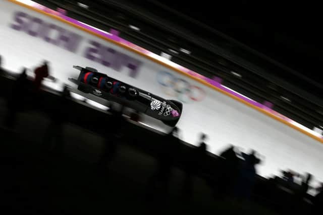 GB captain John Jackson, Scot Stuart Benson, Bruce Tasker and Joel Fearon hurtle down the track. Picture: Reuters