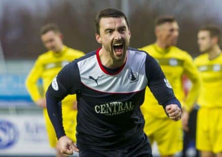 Falkirk's Mark Millar charges off to celebrate his late winning goal. Picture: SNS