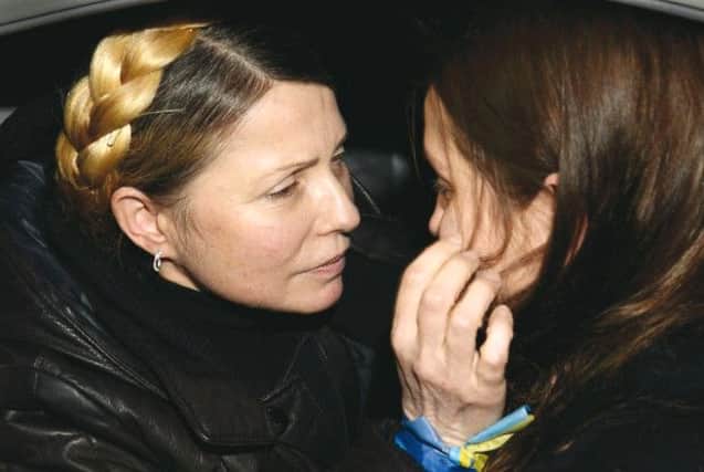 Yulia Tymoshenko hugs her daughter Yevgenia upon arrival at the airport in Kiev. Picture: Reuters