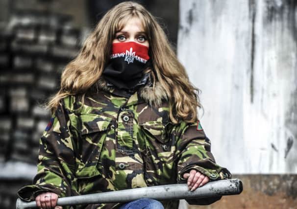An anti-government protestor at the entrance of Independence square in Kiev. Picture: Getty