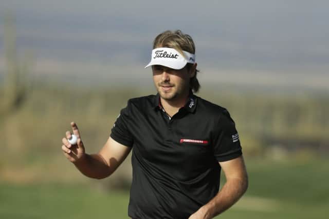 Victor Dubuisson won through to contest the WGC-Accenture Match Play final. Picture: AP