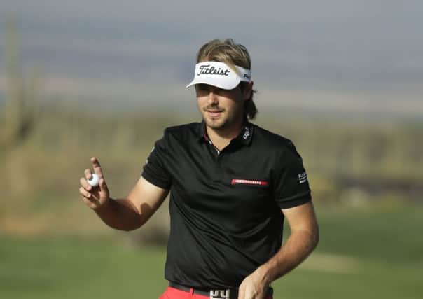 Victor Dubuisson won through to contest the WGC-Accenture Match Play final. Picture: AP