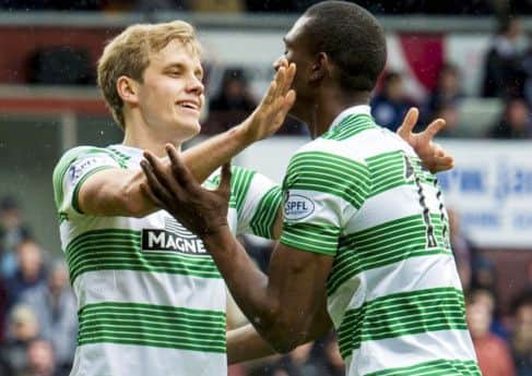 Teemu Pukki celebrates his goal against Hearts with Amido Balde. Picture: SNS