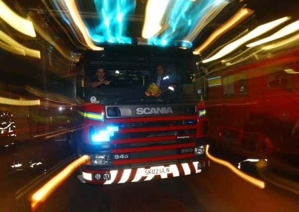Drivers who ignore flashing red lights outside fire stations face a fine and three points on their licence. Picture: TSPL