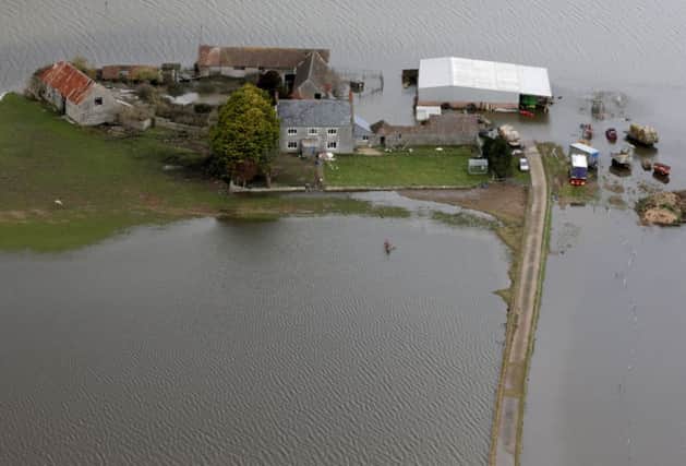 Flood water surrounds a farm close to the village of Muchelney on the Somerset Levels. Picture: Getty