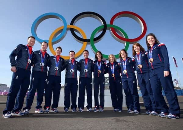 Team GB's curling teams both brought home medals from Sochi 2014. Picture: PA