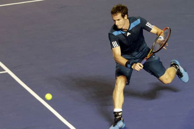 Andy Murray returns the ball to Pablo Andujar. Picture: AFP