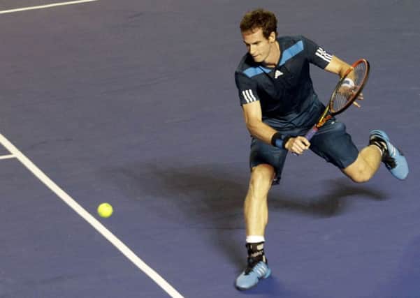 Andy Murray returns the ball to Pablo Andujar. Picture: AFP