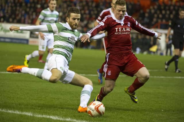 Celtic's Adam Matthews takes on Aberdeen's Johnny Hayes. Picture: PA