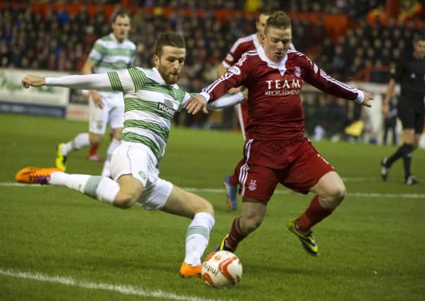 Celtic's Adam Matthews takes on Aberdeen's Johnny Hayes. Picture: PA