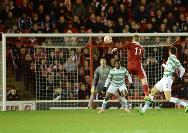 Aberdeen's Jonny Hayes opens the scoring with a glorious long-range strike. Picture: SNS