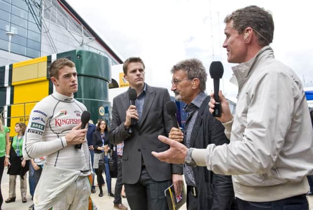 Paul di Resta, left, with David Coulthard, right, and the BBC F1 commentary team. Picture: Ian Georgeson