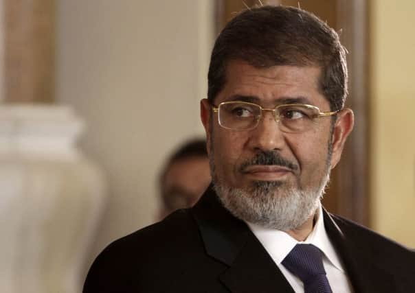 Egyptian President Mohammed Morsi holds a news conference at the Presidential palace in Cairo. Picture: AP Photo