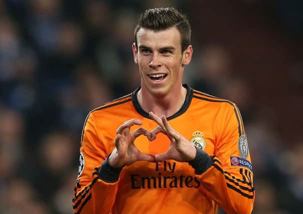 Gareth Bale celebrates scoring Real Madrid's second goal against Schalke. Picture: AFP/Getty.