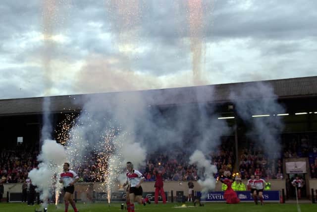 Edinburgh run onto the pitch to fireworks at the Myreside stadium in 2001. Picture: Andrew Stuart