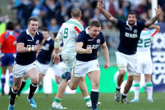 Duncan Weir celebrates after scoring the winning drop goal against Italy. Picture: Getty