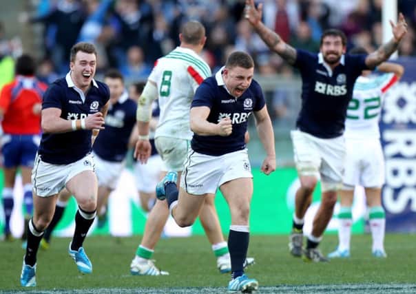 Duncan Weir celebrates after scoring the winning drop goal against Italy. Picture: Getty